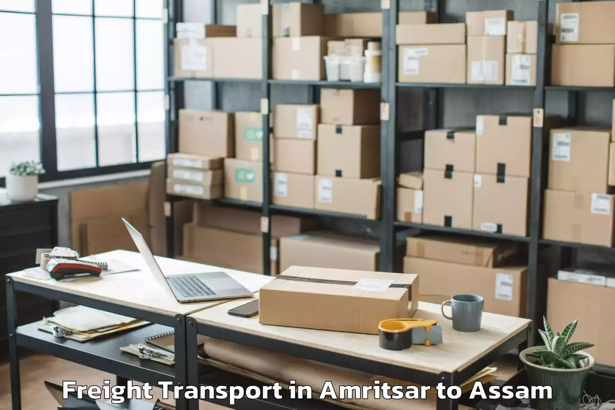 Book Amritsar to Pachim Nalbari Freight Transport Online